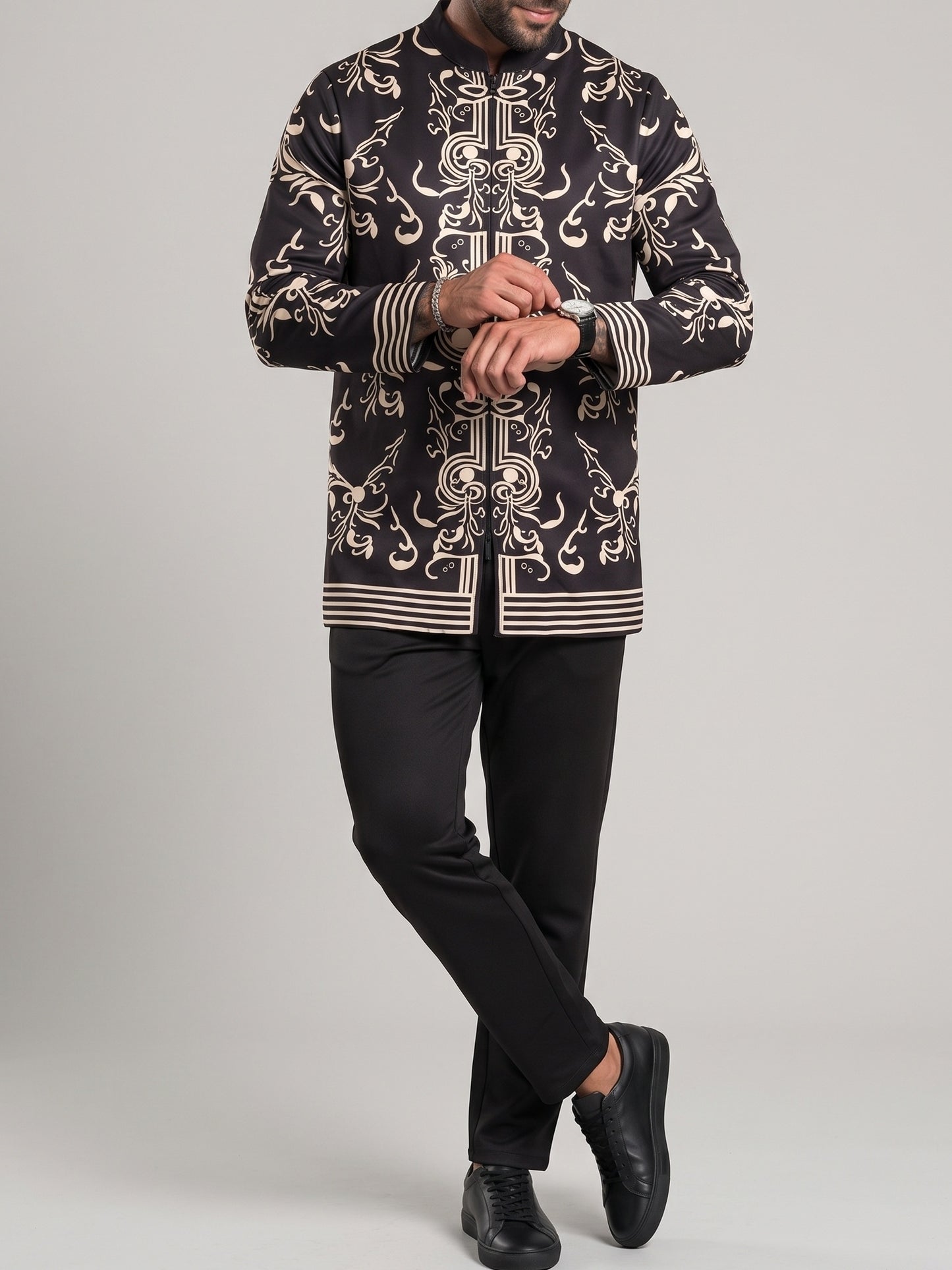 KZZ Men's two-piece set featuring a long-sleeved top and trousers with ethnic-style patterns.