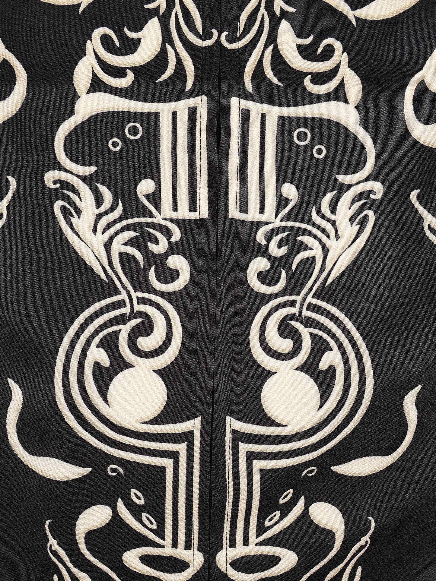 KZZ Men's two-piece set featuring a long-sleeved top and trousers with ethnic-style patterns.