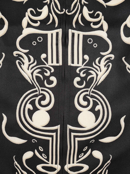 KZZ Men's two-piece set featuring a long-sleeved top and trousers with ethnic-style patterns.